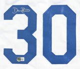 The Sports Integrity Dave Roberts Los Angeles Signed White Baseball Jersey BAS features a large blue 30 with a silver autograph on the upper left of the 3 and an authentication sticker at its base.