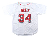 The Sports Integrity David Ortiz Boston Signed White Baseball Jersey (JSA) features red and black accents, Ortiz’s name and number 34 on the back, with a partial white ink signature.