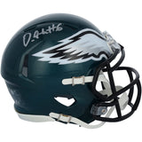 A dark green Devonta Smith Signed Eagles Super Bowl LIX Champions Mini Speed Helmet by Sports Integrity, featuring the team’s white wing logo, black faceguard, and “D. Aut#6” autographed in silver on top.