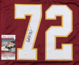 The Sports Integrity Dexter Manley Washington Signed Burgundy Football Jersey features a white number 72, yellow trim, black autograph, and comes with a JSA authentication card beside the number.