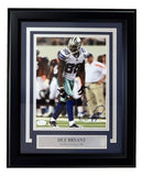 Sports Integrity Dez Bryant Signed Framed 8x10 Dallas Cowboys Photo, authenticated by JSA Hologram, features #88 in uniform with a plaque reading DEZ BRYANT Dallas Cowboys #88.