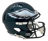 The Sports Integrity Devonta Smith Signed Philadelphia Eagles Full Size Speed Replica Helmet by Fanatics features a dark green shell, white and silver eagle wing logo, black faceguard, white chin strap, and visible autograph on top.