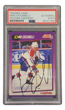 The Sports Integrity Dino Ciccarelli Signed 1991 Score #128 Capitals Hockey Card (PSA/DNA 85041886) features his autograph in black marker on the front, with him in a red, white, and blue Capitals uniform, securely encased in a clear holder.