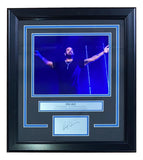 Framed 8x10 concert photo of Drake with arms outstretched, featuring a laser engraved signature. Sold by Sports Integrity.