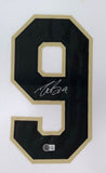 The Sports Integrity Drew Brees New Orleans Signed Framed White Football Jersey BAS features a large black and gold number 9 on a white background, autographed in silver ink with an authenticity sticker at the bottom.