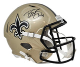 The Drew Brees Signed New Orleans Saints Full Size Speed Replica Helmet by Sports Integrity features a gold shell with a black fleur-de-lis, black facemask, and a bold autograph on top.