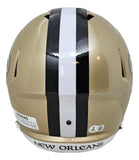 The Drew Brees Signed New Orleans Saints Full Size Speed Replica Helmet by Sports Integrity features a gold finish, a wide black and white center stripe, and “NEW ORLEANS” inscribed at the bottom edge.