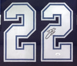 A close-up of the Emmitt Smith Dallas Signed Framed Blue Football Jersey by Sports Integrity, featuring large white number 22 outlined in blue; the right 2 is signed in black with a JSA authentication sticker below.