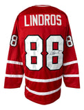 Sports Integrity Eric Lindros Canada Signed Red Hockey Jersey, HOF 16 inscribed, features white stripes, "LINDROS" and #88 on back and sleeves. JSA ITP authenticated.