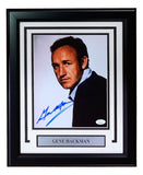 Sports Integrity Gene Hackman Signed Framed 8x10 Photo (JSA) features a color portrait of Hackman with a serious expression, short hair, and a blue ink signature, displayed with a nameplate.