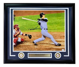 Sports Integrity Hideki Matsui Signed Framed 16x20 Photo—features Matsui in a Yankees pinstripe uniform swinging bat during the 2009 World Series, with catcher behind, two team logos, nameplate, and JSA authentication.