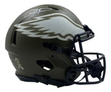 A Jalen Hurts signed Eagles FS Salute to Service Speed Authentic Helmet by Sports Integrity, featuring a dark green design, white wing logo, black faceguard, white autograph on top, and a small back decal.