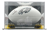 The Sports Integrity Jalen Hurts Signed Eagles Logo Football is displayed in a clear case featuring “CHAMPIONS,” the Super Bowl 59 logo, and Eagles logo etched on the front.