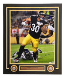 The Sports Integrity James Conner Signed Matted 16x20 Pittsburgh Steelers Photo features #30 running with the ball, includes his autograph, and comes with a JSA Hologram.