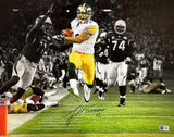 A James Harrison Signed 16x20 Pittsburgh Steelers Super Bowl XLIII Photo by Sports Integrity shows Harrison in a yellow and black uniform carrying the ball, pursued by defenders, with his autograph clearly visible.