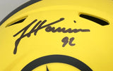 A yellow James Harrison Signed Pittsburgh Steelers FS Rave Speed Replica Helmet by Sports Integrity features a black signature, the number 92, and part of a black star logo at the bottom.