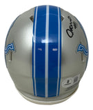The Jameson Williams Signed Detroit Lions Mini Speed Helmet by Sports Integrity features a silver finish with blue stripes, team logos on the sides, his signature, and a BAS authentication sticker on the back.