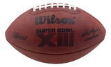 A Sports Integrity Mean Joe Greene Steelers Signed Wilson Super Bowl XIII Duke Football, featuring “Official,” the commissioner’s signature, and white laces on a brown textured surface. HOF 87 BAS authenticated.
