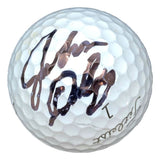 A John Daly signed Titleist Pro V1 golf ball from Sports Integrity, featuring a bold autograph that covers most of the white surface.
