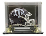 The Sports Integrity Johnny Manziel Signed Texas A&M Mini Speed Helmet with "12 Heisman" inscription sits in a clear display case with a black and gold base.