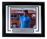 Sports Integrity Jon Gries Signed Framed 8x10 photo as Uncle Rico from Napoleon Dynamite, with quote, BAS authenticated. Features him in a blue and white shirt before an orange van; includes engraved plaque.