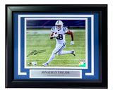 The Sports Integrity Jonathan Taylor Signed Framed 8x10 Indianapolis Colts Photo by Fanatics shows #28 running with the ball in a white and blue uniform, with his autograph and nameplate included.