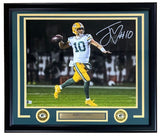 Sports Integrity’s Jordan Love Signed Framed 16x20 Green Bay Packers Photo features him in a green and yellow #10 uniform throwing a pass, with autograph, two Packers logos, and nameplate included. BAS ITP authenticated.