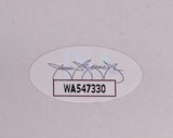 A white oval sticker featuring the JSA hologram, with a faint blue ISA, bold black code WA547330, and included on the Sports Integrity Jamie-Lynn Sigler Chianese Turturro signed Sopranos pilot script.