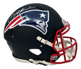 The Sports Integrity Julian Edelman Signed New England Patriots FS Black Authentic Speed Helmet features Edelman's autograph in white ink on a black shell with the team logo, authenticated by JSA.