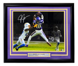 Sports Integrity's Justin Jefferson Signed Framed 16x20 Photo features him catching a pass vs. the Chargers in a Vikings jersey. Includes autograph and nameplate.
