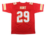 The Sports Integrity Kareem Hunt Kansas City red football jersey features yellow and white sleeve stripes, HUNT and 29 on the back, and a PSA/DNA-signed number 29.