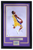 The Sports Integrity Kobe Bryant Framed 13x19 Lakers Lithograph, signed by Tony Santiago with laser auto, features a mid-air Kobe in yellow jersey, purple and gold matting, his signature, and a plaque at the bottom.