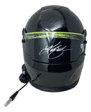The Sports Integrity Kurt Busch Signed NASCAR Full Size Replica Racing Helmet BAS is a black helmet with a green visor streak, white autograph on the front, and wiring with a plug on the left side.
