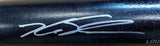 A close-up of the Kyle Schwarber Philadelphia Phillies Signed Black Louisville Slugger Bat by Sports Integrity, featuring a white signature on its glossy, textured surface.