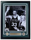 Sports Integrity’s Larry Bird Signed White Framed 16x20 Celtics Photo features Bird with Auerbach, his autograph, and team logos. Perfect for fans and collectors. Authenticated by JSA.
