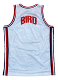 The Sports Integrity Larry Bird Custom Olympic Basketball Jersey is white with red and blue side stripes and "BIRD" in bold red letters across the upper back.