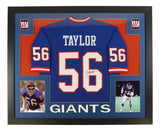 Sports Integrity Lawrence Taylor New York Signed Framed Blue Football Jersey with TAYLOR, #56, autograph (JSA QR Hologram), and two action photos; "GIANTS" displayed at the bottom.