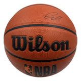 The Sports Integrity Luka Doncic Los Angeles Lakers Signed NBA Wilson Forge Basketball features a textured orange surface, black grip lines, visible Wilson and NBA logos, and Luka Doncic’s signature above the logo. PSA/DNA authenticated.