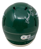 The Sports Integrity Jordan Mailata Signed Philadelphia Eagles Kelly Green Mini Speed Helmet features a white signature with "8x" on top, plus a Beckett authentication sticker and warning label on the back.