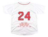 The Sports Integrity Manny Ramirez Boston Signed White 2004 WS MVP Stat Baseball Jersey features red trim, the number 24, an autograph, and gold text with his World Series MVP stats on the back.