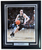 Sports Integrity Manu Ginobili Signed Framed 16x20 Spurs Photo features #20 dribbling on court, includes autograph and nameplate; JSA authenticated.