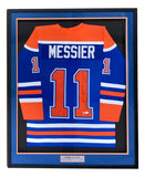 The Sports Integrity Mark Messier Edmonton Signed Framed Blue Hockey Jersey JSA features Messier's name and #11, a signature, and a nameplate, all professionally mounted in a black display frame.