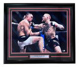 Sports Integrity Conor McGregor Signed Framed 16x24 UFC Nate Diaz Fight Photo BAS—features McGregor and Diaz in action with a signature plaque below the image.
