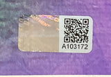 A rectangular sticker with a QR code and the alphanumeric code A103172 on a purple background, plus a faint holographic section, comes with the Megan Rapinoe Signed Framed 16x20 USA Women's Soccer Photo by Sports Integrity.