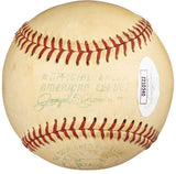 A Sports Integrity Mickey Mantle New York Yankees 1960s signed American League baseball with red stitching, faint green text, a white sticker marked Z210540, and scuffs indicating use. Authenticated by PSA/DNA LOA.