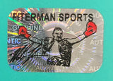 A shiny, iridescent holographic sticker from Sports Integrity features "GERMAN SPORTS" and "GENUINE AUTHENTIC," with a boxer in red gloves, included with the Mike Tyson Signed 8x10 Boxing Punch Out Photo Tyson Hologram.