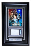 Sports Integrity's Millie Bobbie Brown Signed Framed Collage includes an 8x10 Stranger Things photo, cast illustration, and a plaque, all authentically PSA certified.