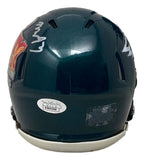 A Milton Williams Signed Philadelphia Eagles Super Bowl 59 Mini Speed Helmet by Sports Integrity is shown from the back, featuring his signature on the upper left, a JSA serial sticker, warning label, and colorful Eagles logo.