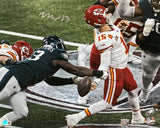 Milton Williams strips the ball from Chiefs QB Mahomes in this signed 16x20 Eagles Super Bowl 59 photo, available from Sports Integrity.