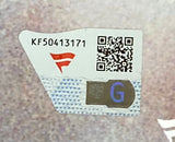 A close-up of a Sports Integrity sticker for the "Joe Montana Jerry Rice Signed Framed 16x20 San Francisco 49ers Photo Fanatics," featuring code KF50413171, a red logo, black and white QR code, and blue G security feature.